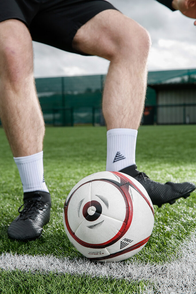 Ball Control - Pendle football next to a footballer's feet